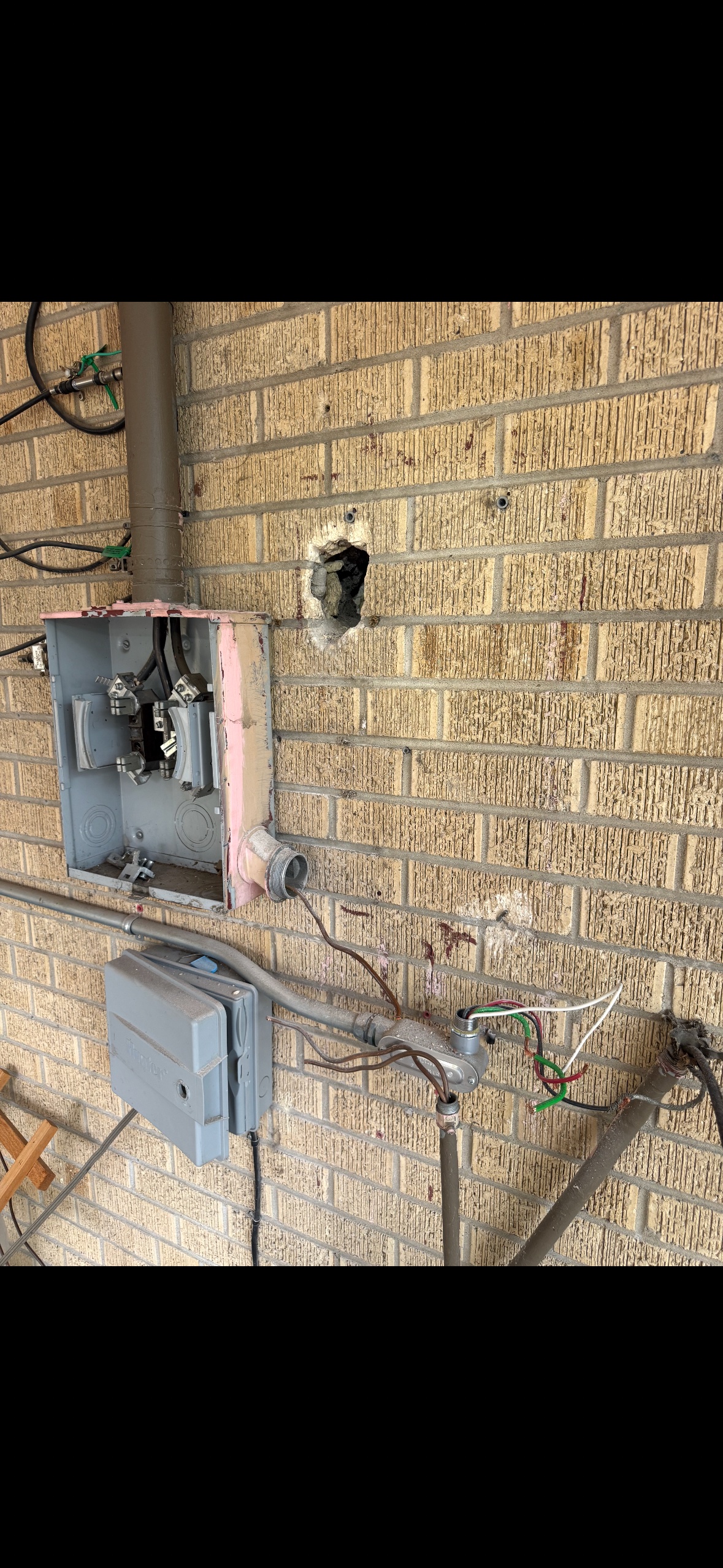 Old meter and panel before replacement
